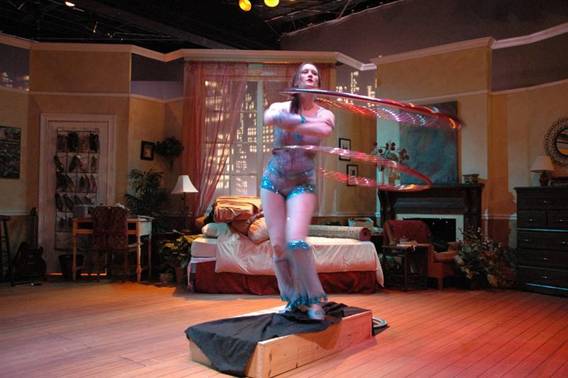 Mika twirls multiple hoops.